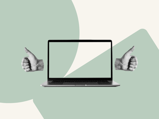 Two hands make thumbs up signs beside a laptop screen