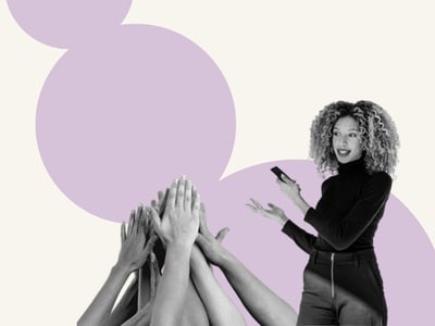 A woman speaks to staff