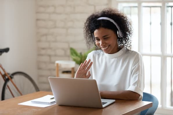 woman using traditional marketing tactic during meeting