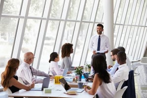 board of directors listens to man
