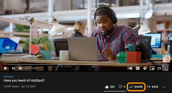 a youtube video with the share button circled