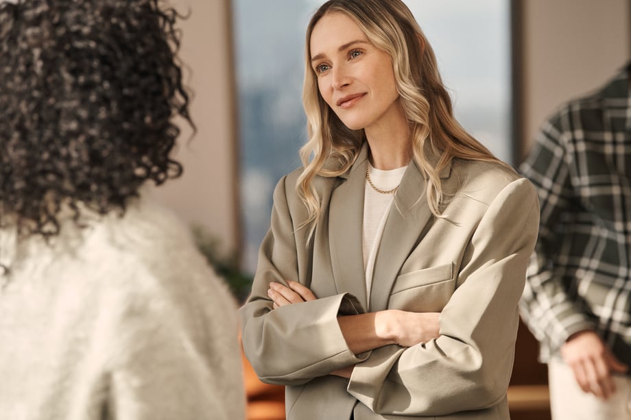Woman talking to other woman OTS
