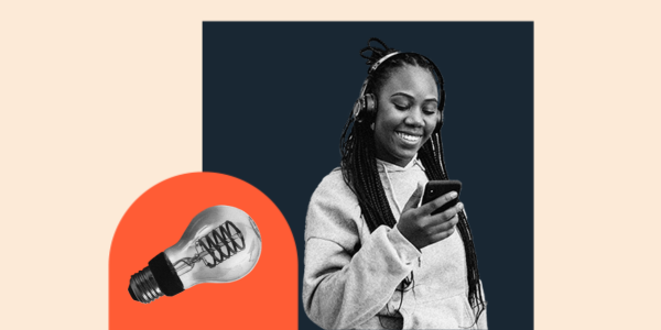 Person looking down at phone with information about WordPress migration plugin options and lightbulb adjacent to them 