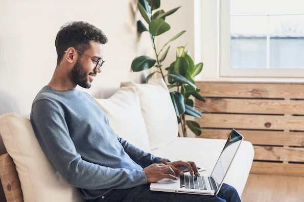 person using a computer to edit and customize WordPress user roles
