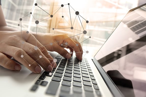 Double exposure of business man hand working on blank screen laptop computer on wooden desk as concept with social media diagram.jpeg