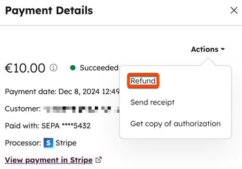 Menu suspenso Ações em um registro de pagamento do HubSpot, com a opção "Reembolso" destacada.