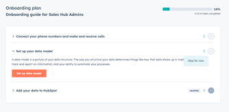 HubSpot onboarding plan displaying a list of setup tasks with options to create content, skip, or mark as complete.