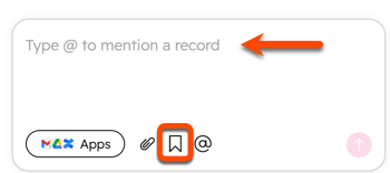 Chat input showing "Type @ to mention a record" with an orange arrow, and an orange box highlighting the bookmark icon to access saved prompts.