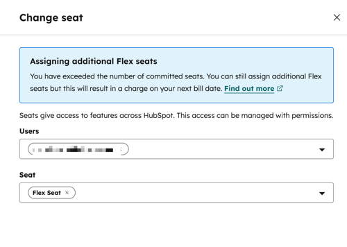 Change seat dialog with an info alert explaining that assigning additional Flex seats will result in a charge on the next bill date.