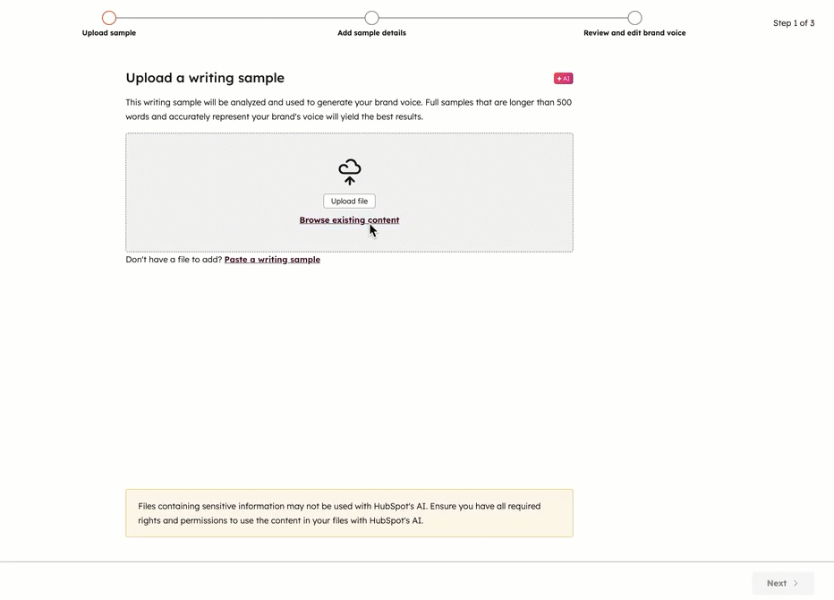 Animated screenshot showing the process to generate brand voice after uploading a writing sample.