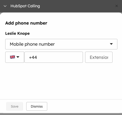 A gif displaying how to set a country code when adding a phone number.