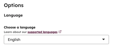 The chatflow editor, showing the setting to choose a language.
