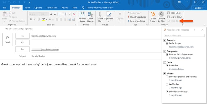 Outlook compose window, highlighting the option to log an email to the email recipient's associated CRM records using the HubSpot Sales Outlook desktop add-in.