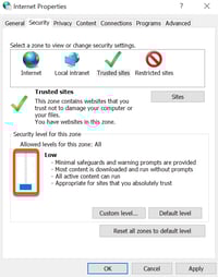 Internet Properties window showing the Trusted sites tab selected and the security level slider set to Low.