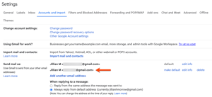 Gmail Accounts settings , showing two connected email addresses/aliases. An arrow points to the secondary alias.