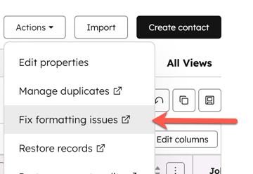 A HubSpot 'Actions' dropdown menu. A red arrow points to the 'Fix formatting issues' option within the menu, which is used to resolve data quality problems.