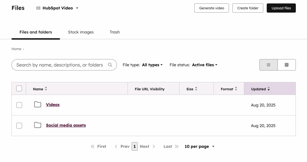 Dragging and dropping a file into HubSpot's files tool for upload.