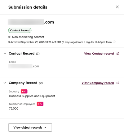 A screenshot of the 'Submission details' for a contact record. The page displays information including a contact record and a company record with AI-populated data for 'Industry' and 'Number of Employees.'