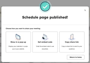 The Share your meeting dialog box in HubSpot with options to show in a pop-up, get embed code, or copy the share link.