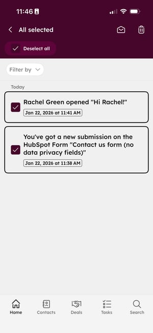 HubSpot mobile app notifications screen showing two selected notifications with options to mark as read or delete at the top.