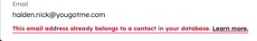 A contact's email property showing a red message stating the address already belongs to another contact in the database.