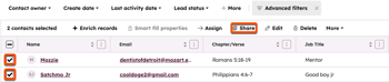 A HubSpot contacts table view with two contacts, Mozzie and Satchmo Jr, selected. A Share button in the bulk action toolbar is highlighted with an orange box.