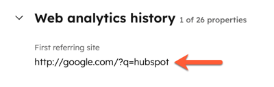 A contact's first referring site property value, highlighting the q parameter, or search team, shown in the URL.