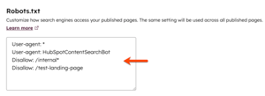 In the page settings, on the SEO & Crawlers tab, the Robots.txt section is displayed. An arrow points to the text input field to edit the robots.txt file.