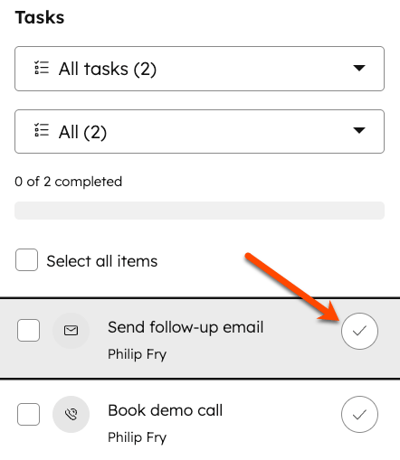 A task list, showing two tasks to complete. The checkbox to the right of the first task is highlighted.