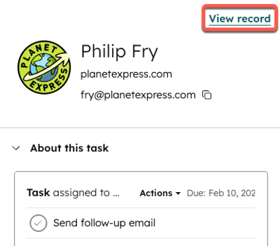 A contact record preview panel, with the View record link in the upper right highlighted.