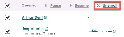 A list of contacts enrolled in a sequence. The checkboxes next to both contacts are selected, and the Unenroll button at the top of the list is highlighted.