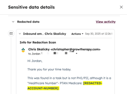 A screenshot showing redacted information on an email.