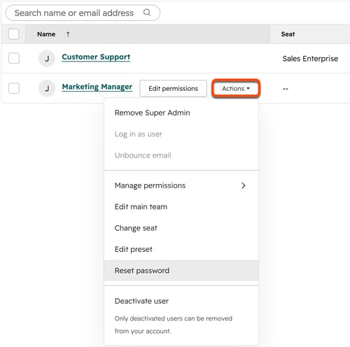 HubSpot user management table, displaying the Actions dropdown open and Reset password selected for a user.