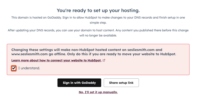 The domain connection page is displayed to configure DNS records. A box is placed around the 'I Understand' checkbox to confirm settings. Two buttons appear 'Sign in with GoDaddy'' and 'Share setup link'. Hyperlinked text is visible 'No I'll set it up manually'.