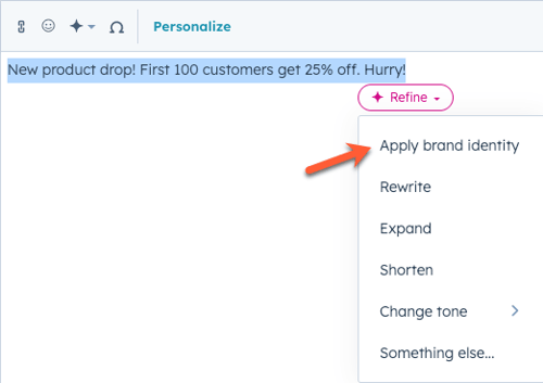 Applying the brand voice to an SMS message by selecting 'Apply brand identity' from the Refine menu in the SMS editor.