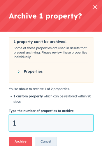 Dialog box to archive one property out of two. One property cannot be archived because it is currently used in assets. The user is asked to type the number of properties to archive, with '1' displayed. Options to 'Archive' or 'Cancel