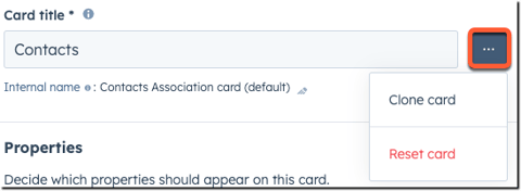 Input field labeled "Card title" with "Contacts" entered. Below, "Internal name" shows "Contacts Association card (default)". A three-dot ellipses icon, highlighted with an orange border, is open, displaying options to "Clone card" and "Reset card". The "Properties" section is visible below