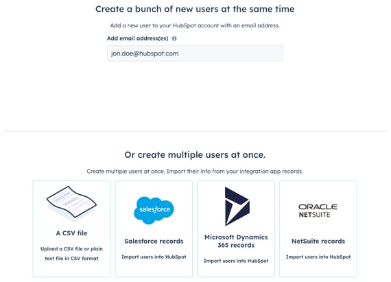 HubSpot's user creation screen with options to add users by email address, CSV file, or from integrations like NetSuite and Salesforce.