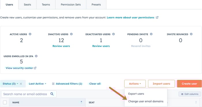 Screenshot showing the option for Change user email domains under the Actions button in HubSpot. 