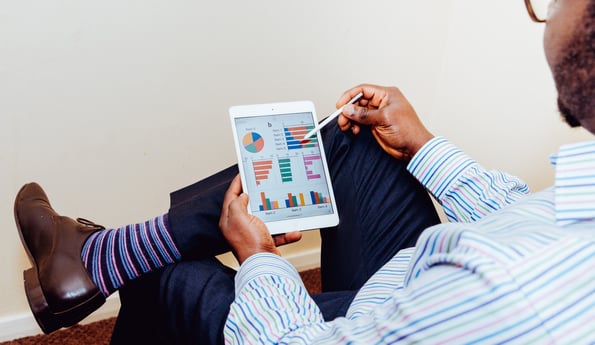 Sales manager checking data on a digital tablet