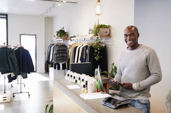 An entrepreneur who is selling his clothes to a niche market of men looking for professional attire