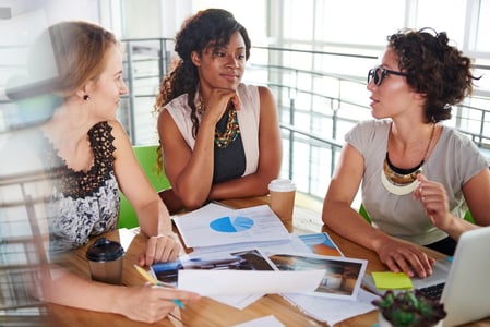 team of successful business people having a meeting in executive sunlit office.jpeg