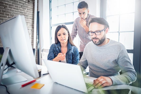 Team choosing best website builder for their business needs and goals