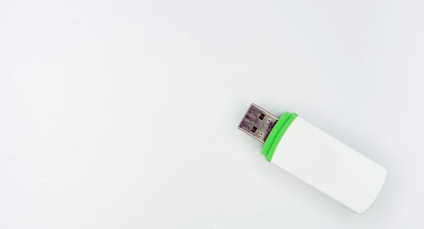 White USB thumb drive with neon green trim