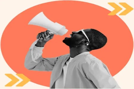 A man shouts into a megaphone to represent advertising
