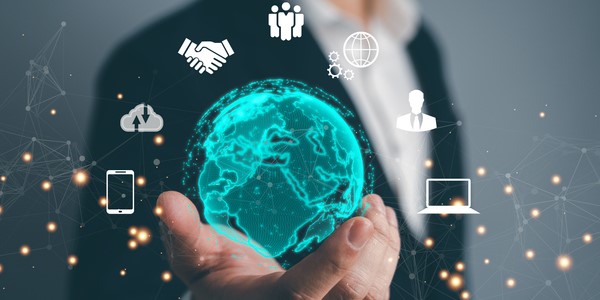 A man in a suit holds a digitized version of the world in his hand, which is surrounded by different social media icons  symbolizing AI marketing automation.