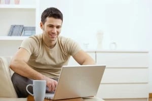 person on laptop researching the anatomy of a webpage