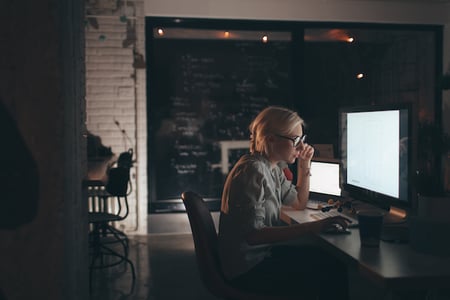 person learning api architecture on a computer in an office