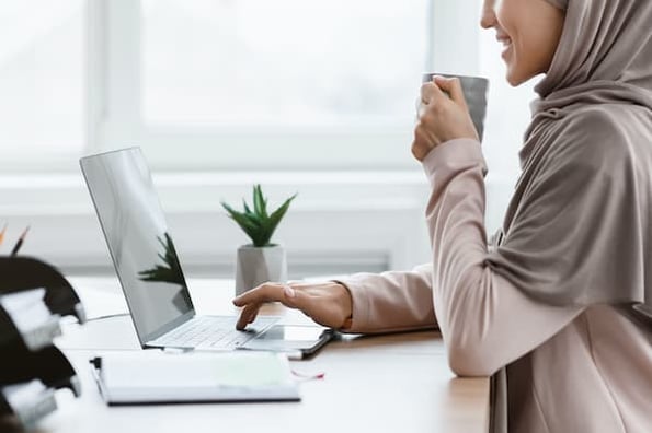 Woman writing a blog