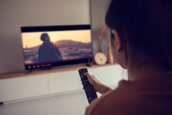 A person watches memorable Australian commercials.